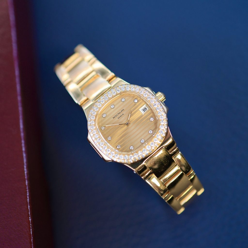 Patek Philippe Nautilus Lady ref. 4700 (incl. uittreksel)